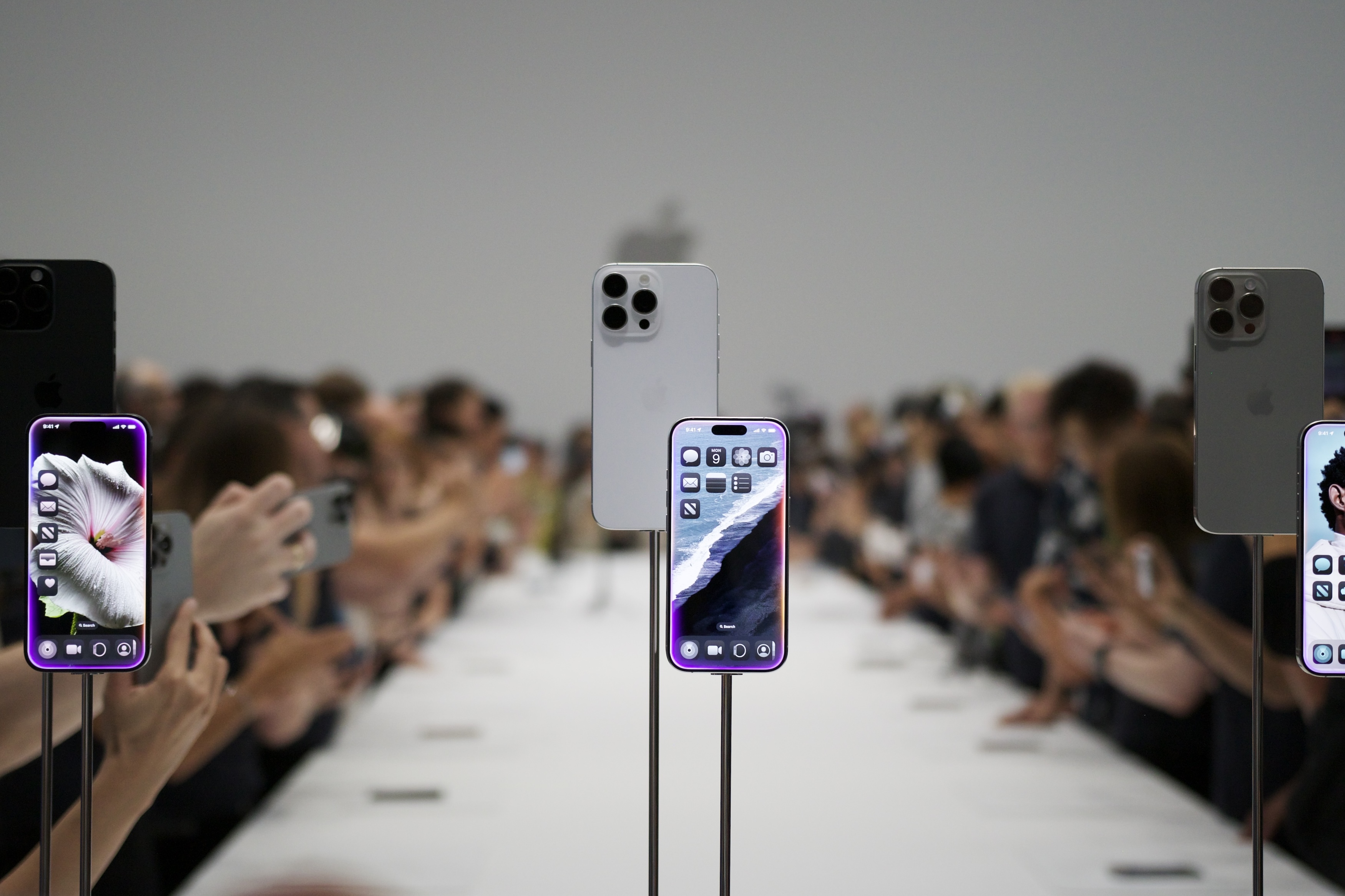 alt text: The iPhone 16 Pro displayed at Apple Park.