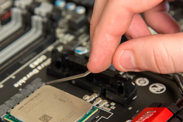 Closing the CPU socket lever.