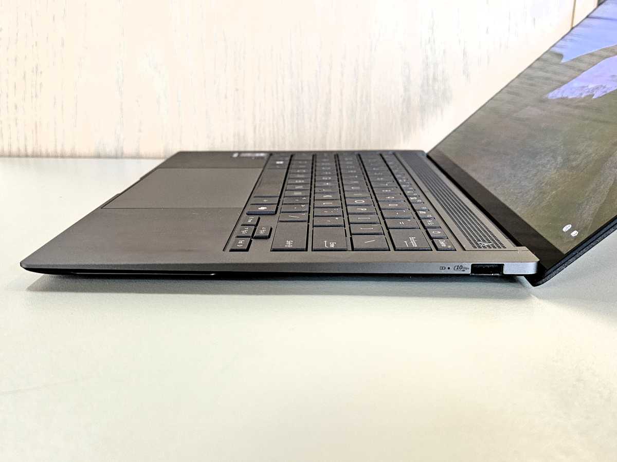 alt text: The right side of the Asus Zenbook S 14, featuring a USB-A port and a headphone jack.