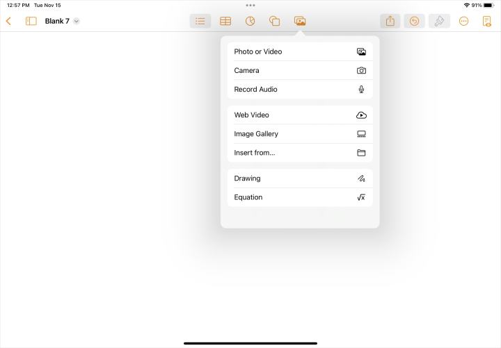 alt: Media menu in Pages for iPad showing various import options.