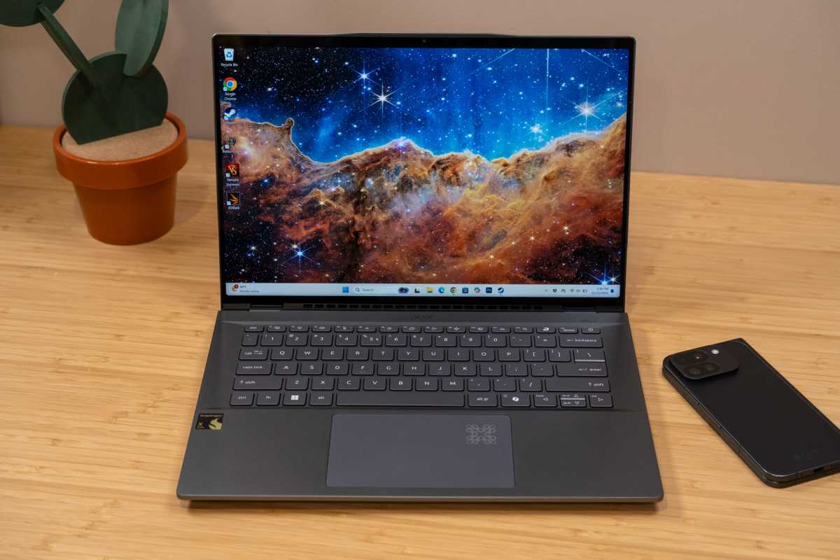 alt text: The Acer Swift 14 AI laptop, open and displaying the home screen.