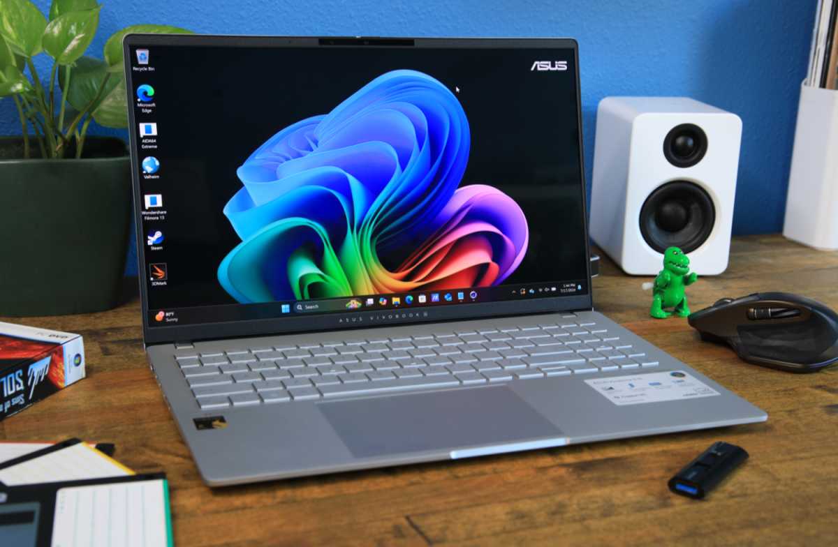 alt text: The Asus Vivobook S 15 displaying a vibrant image, showcasing the quality of its OLED screen.