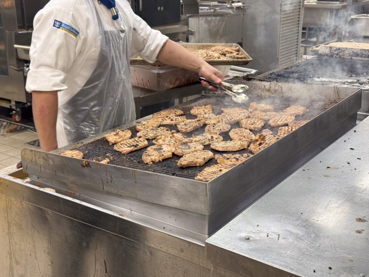 Chicken grilling in the galley aboard Royal Caribbean Allure of the Seas