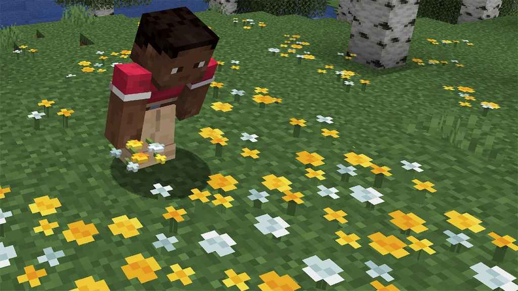 alt: Wildflowers add a touch of color to a Minecraft forest biome.