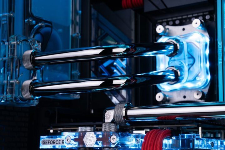 alt text: Close-up view of the custom watercooling loop inside a Maingear Rush PC.