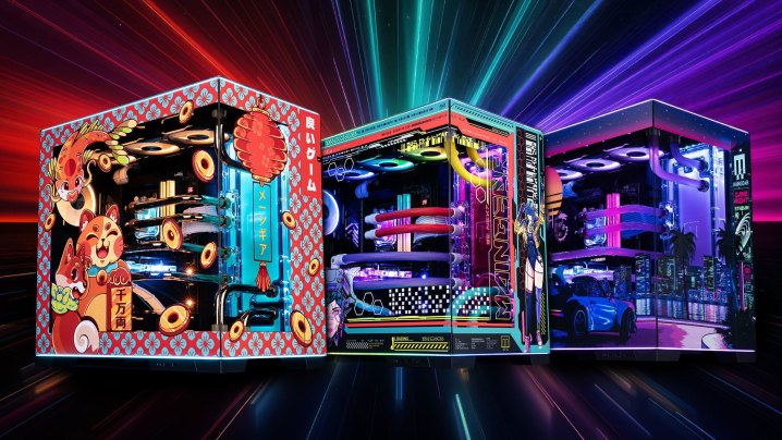 alt text: Maingear Rush gaming PCs with custom artwork and water cooling displayed at CES 2025.