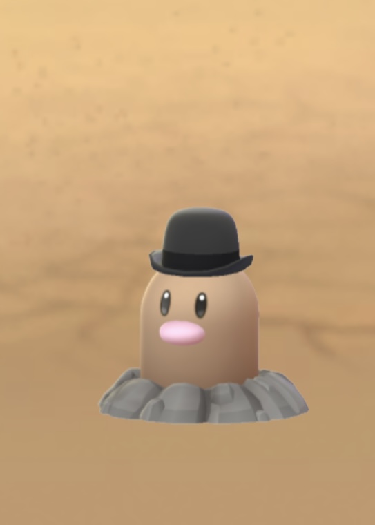 Diglett wearing a bowler hat in Pokémon Go