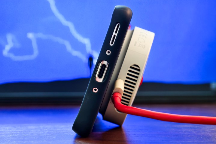 OnePlus AirVOOC 50W charger used as a stand.