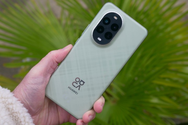 A person holding the Huawei Nova 13 Pro.