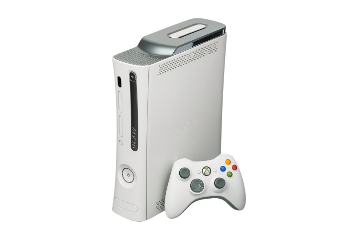 An Xbox 360 stands against a white background.