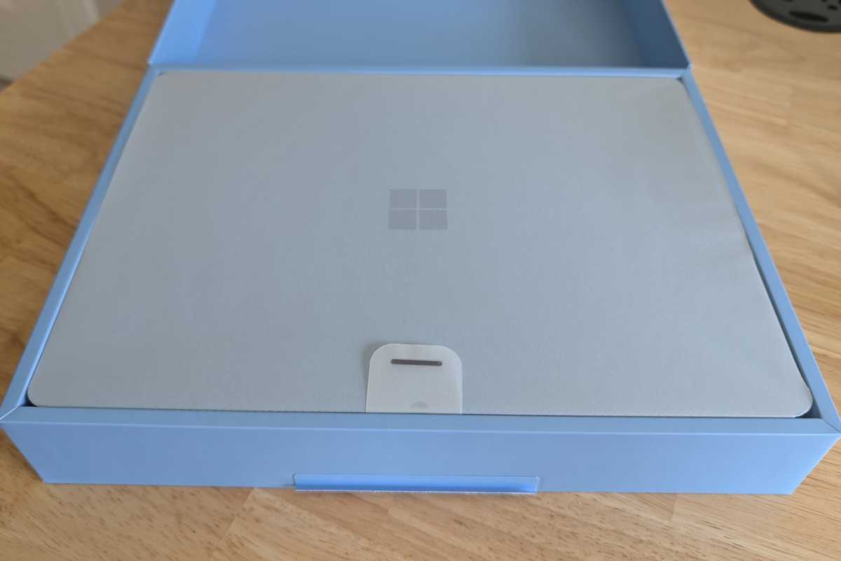 alt: A new Surface Laptop in its original packaging.