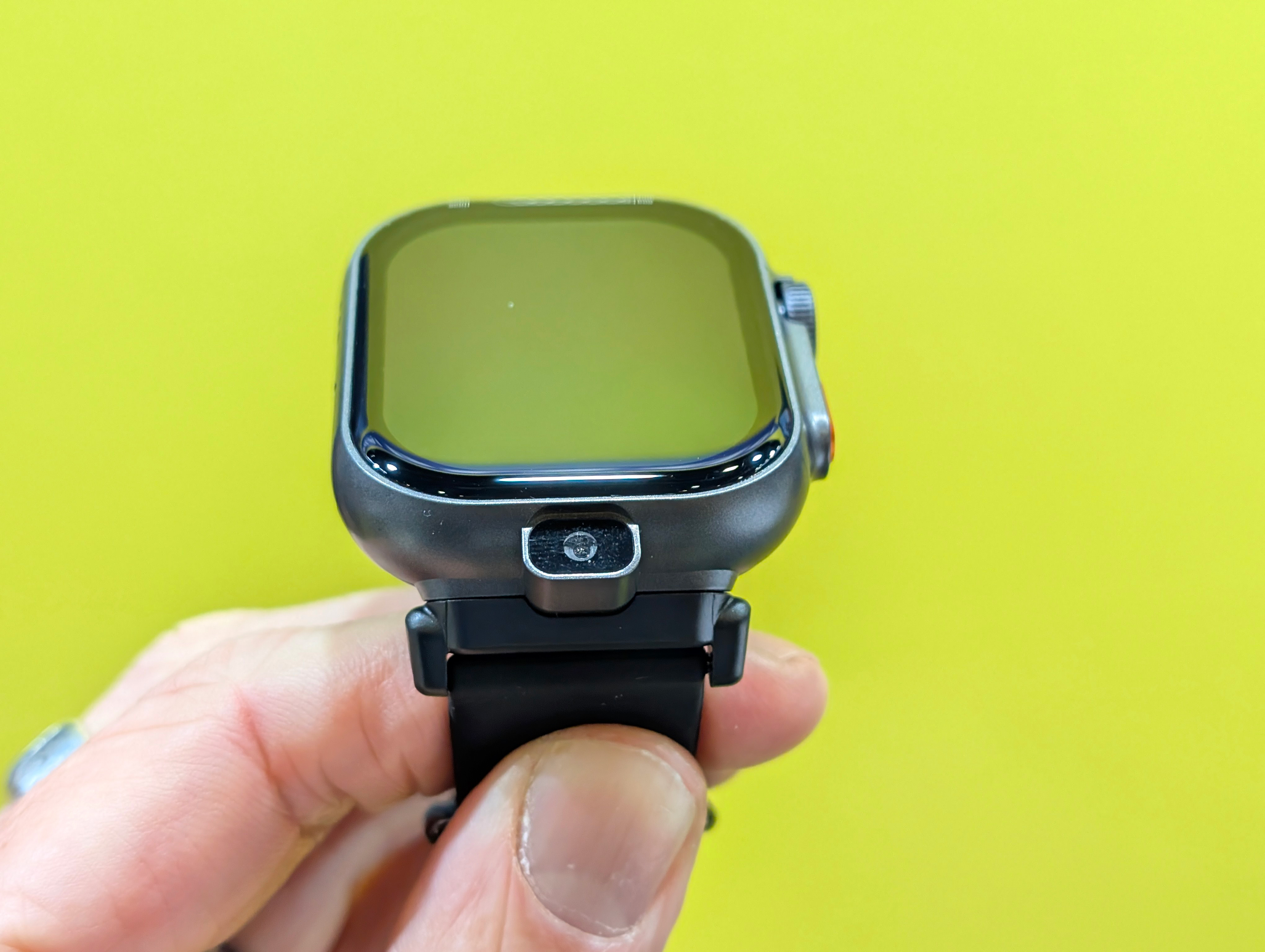 Pinwheel Smartwatch in hand with the camera