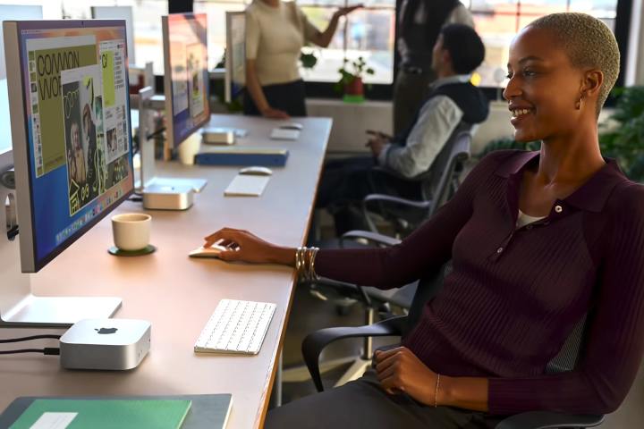 The M4 Mac mini being used in a workplace.