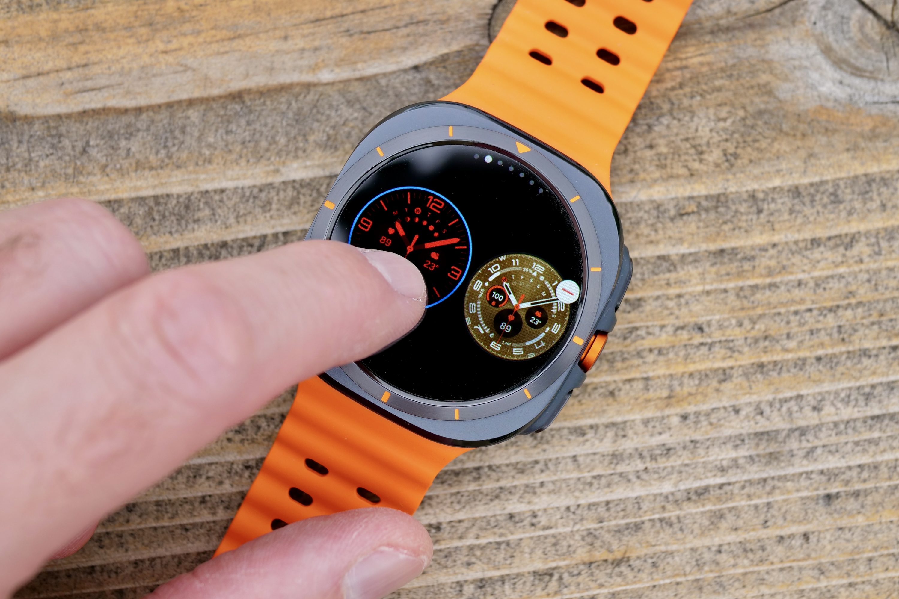 A person changing the watch face on the Samsung Galaxy Watch Ultra.