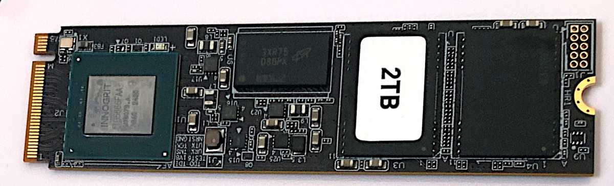 alt text: Close-up of the Teamgroup GE Pro SSD with its graphene heat spreader.