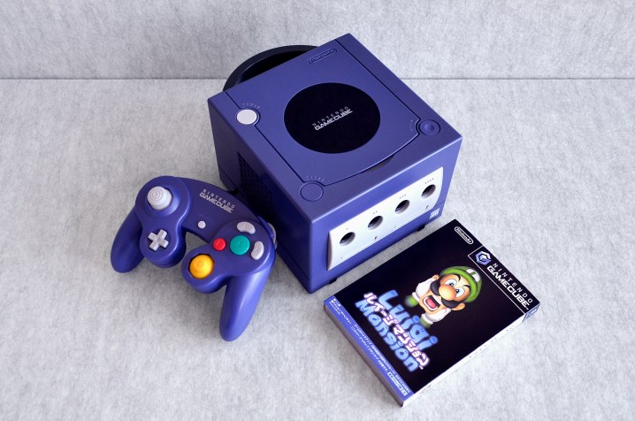 alt: A Nintendo GameCube console with Luigi