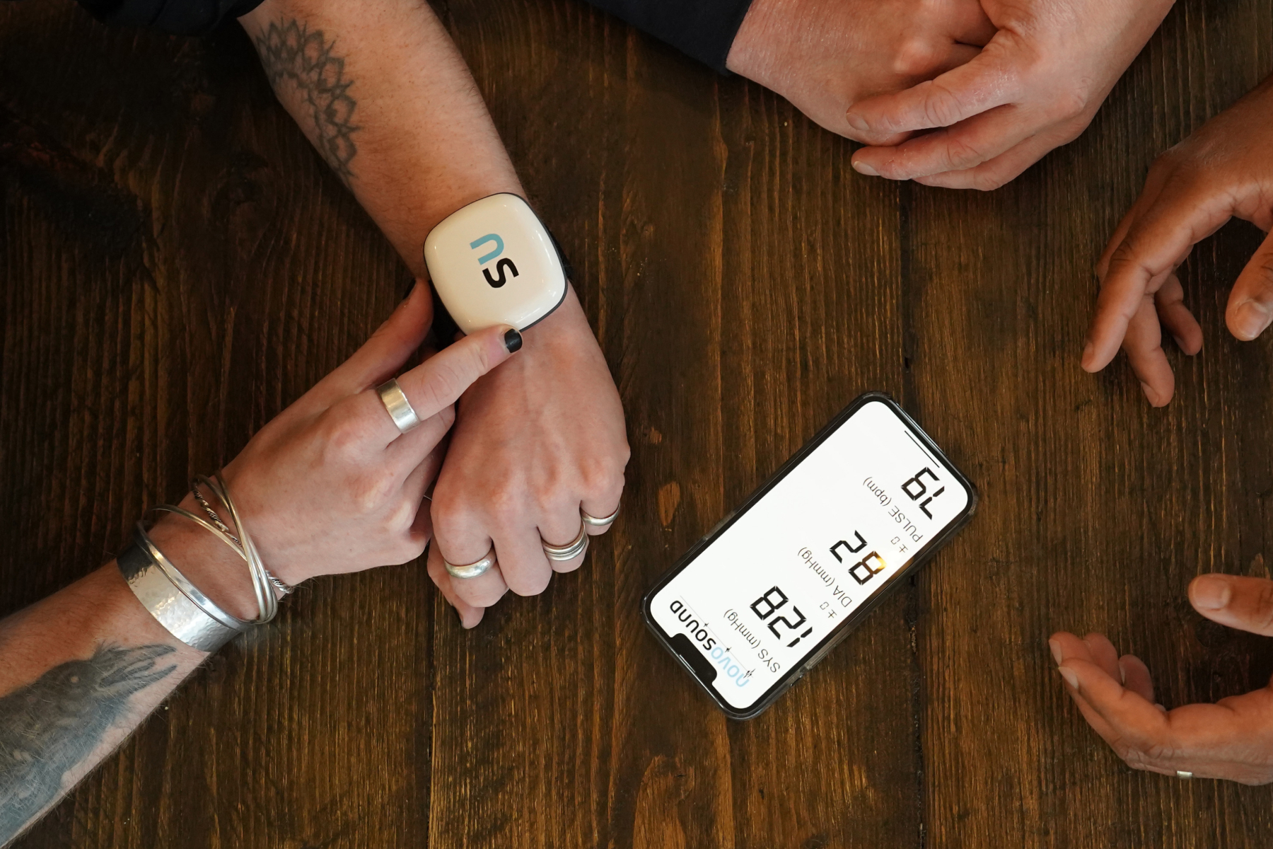 A person wearing Novosound's blood pressure wearable.