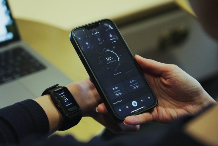 The Pison app and wearable showing sleep data.