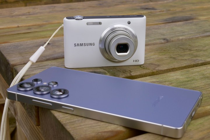 The Samsung ST72 camera next to the Samsung Galaxy S25 Ultra.