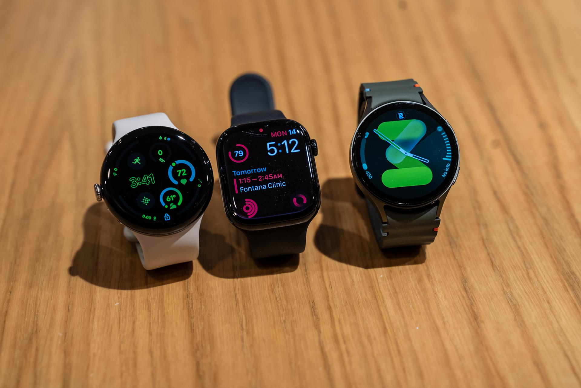 The Pixel Watch 3, Apple Watch Series 10, and Galaxy Watch 7 next to each other.