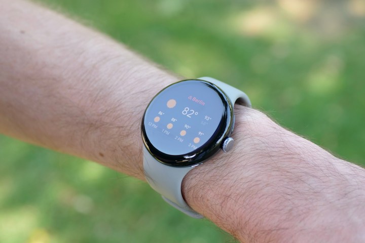 A person wearing the Google Pixel Watch.