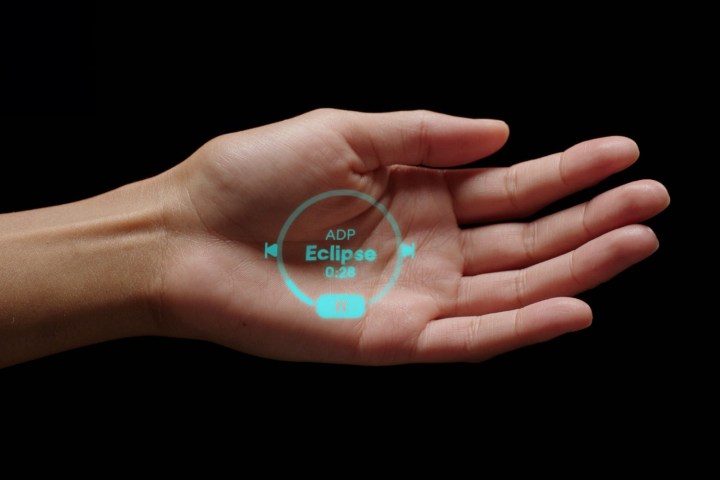 A person using the Humane AI Pin.