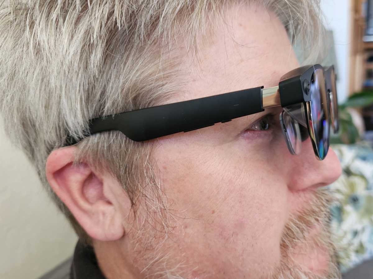 Sightful Spacetop primary XReal glasses on face 2