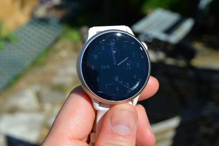 The Garmin Vivoactive 6 with scratches visible.