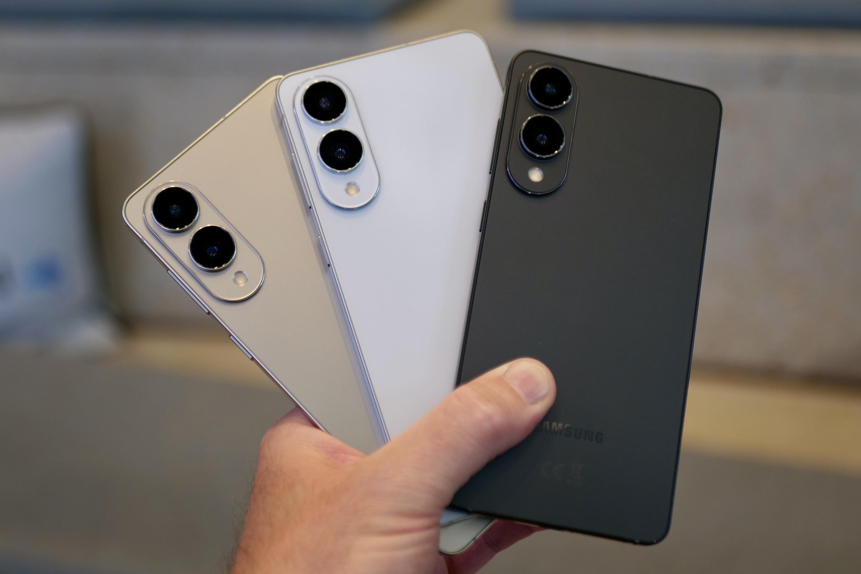 A person holding the Samsung Galaxy S25 Edge showing the color options.