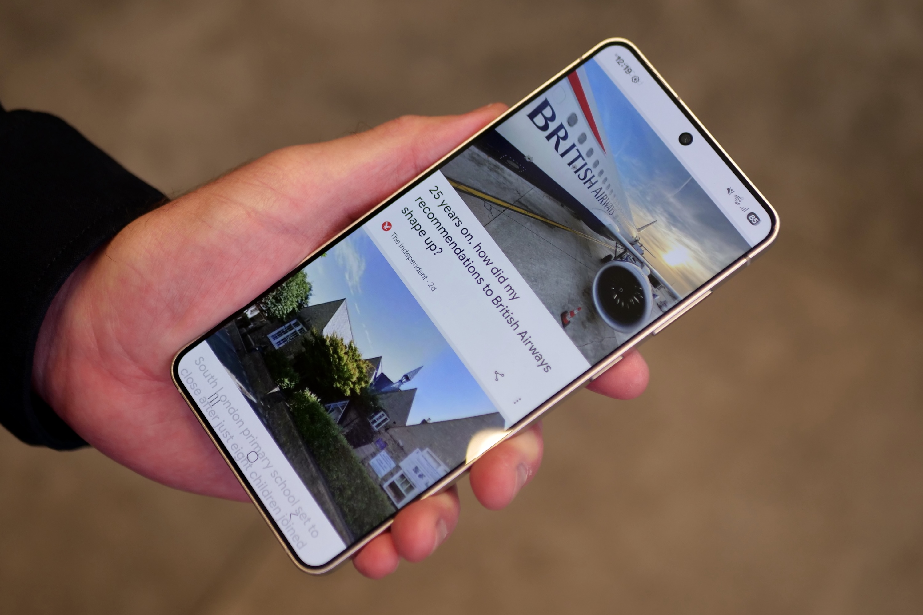 A person holding the Samsung Galaxy S25 Edge.