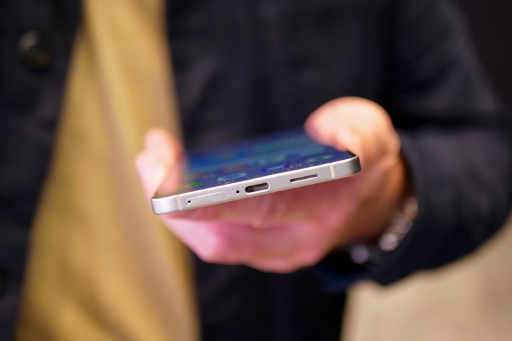A hand holding the Samsung Galaxy S25 Edge.