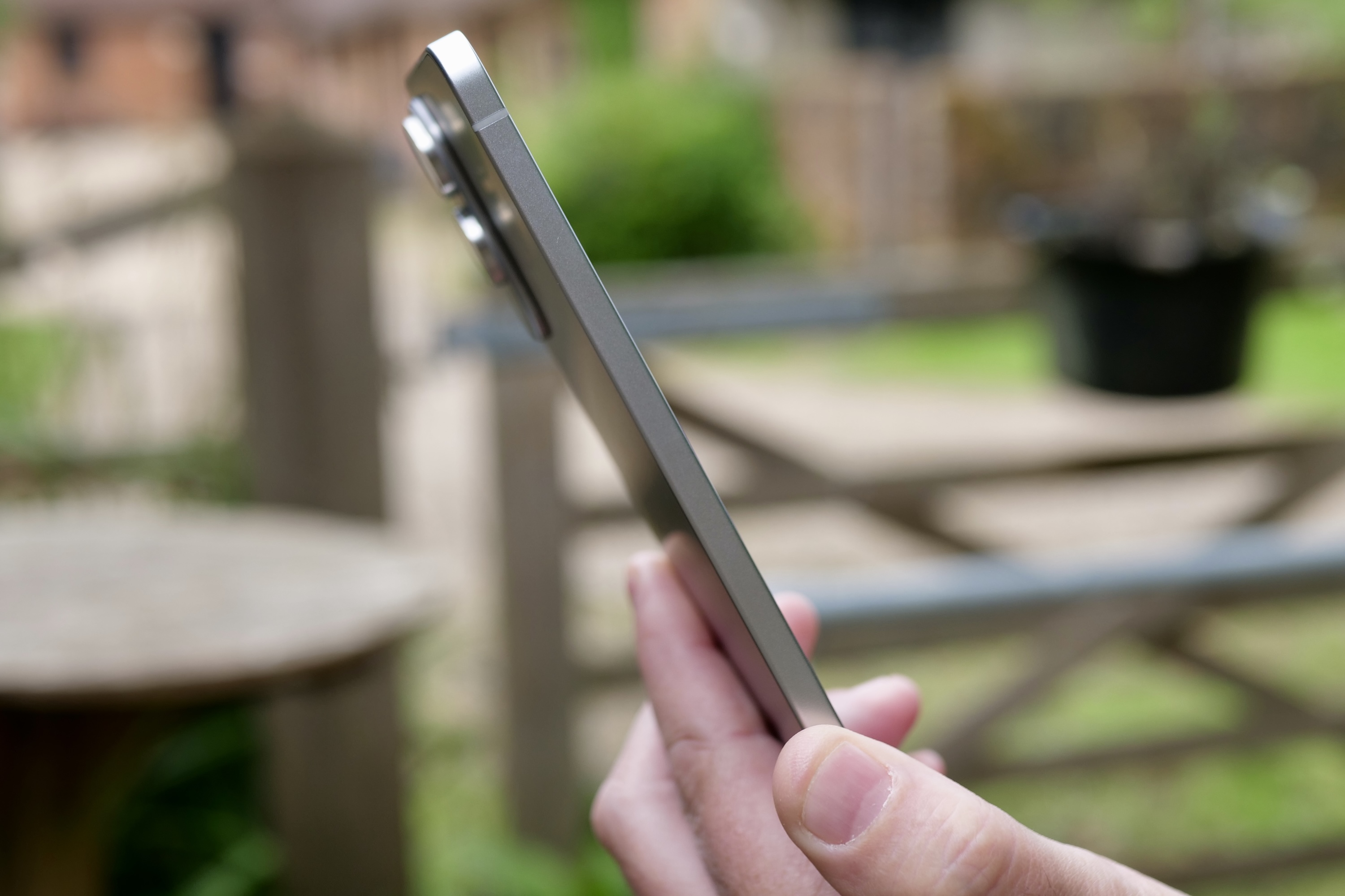 A hand holding the ultra-thin Samsung Galaxy S25 Edge smartphone