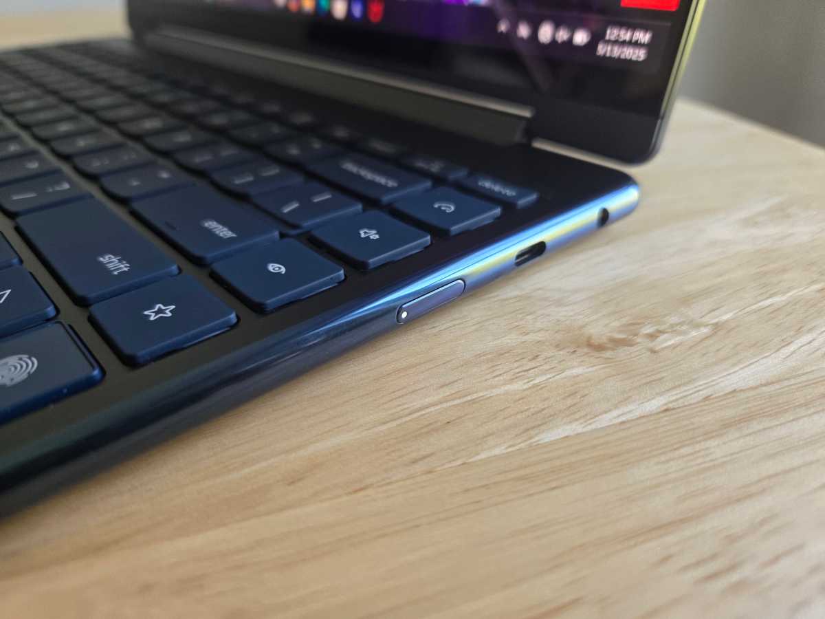 Side view of the Lenovo Yoga 9i 2-in-1 detailing its array of connectivity ports including Thunderbolt 4 and USB-A.