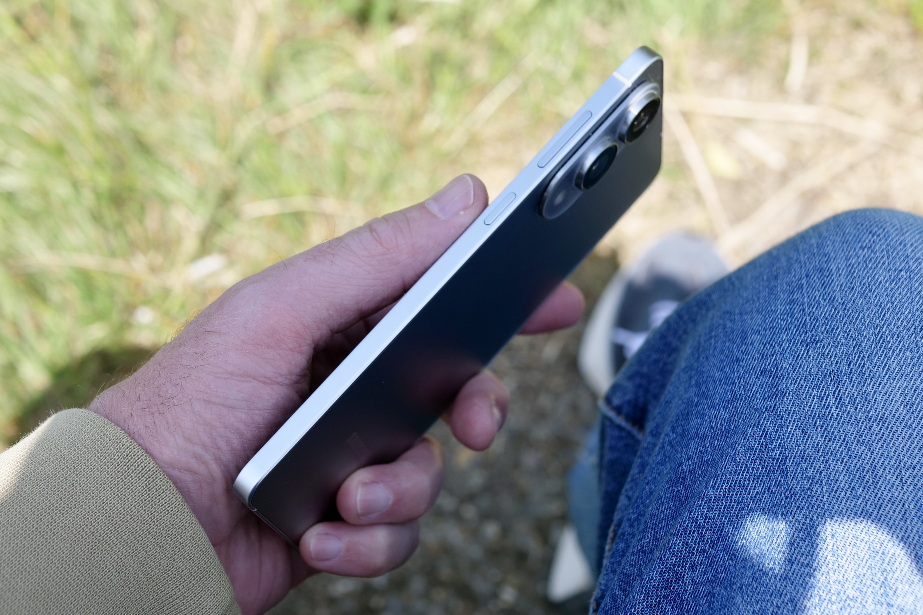Hand holding a slim Samsung Galaxy S25 Edge, illustrating the design trend Apple could adopt for a thinner iPhone 17 range.