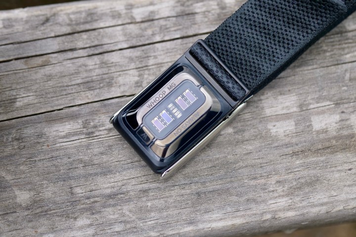The Whoop 5.0 fitness tracker module with its distinctive black band.