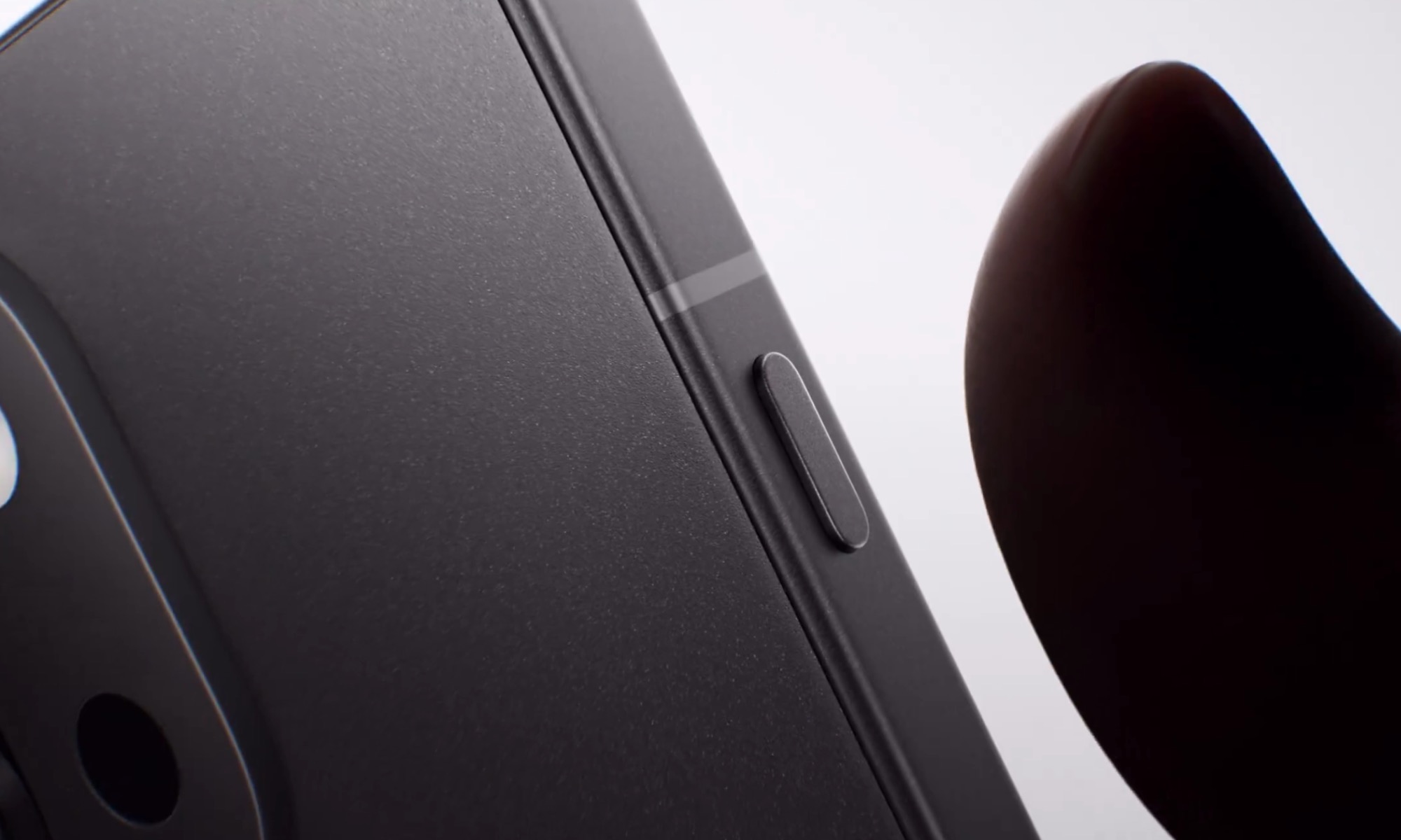 Close-up of the dedicated Plus Key on the OnePlus 13s, used to activate the AI Plus Mind feature for instant content capture.