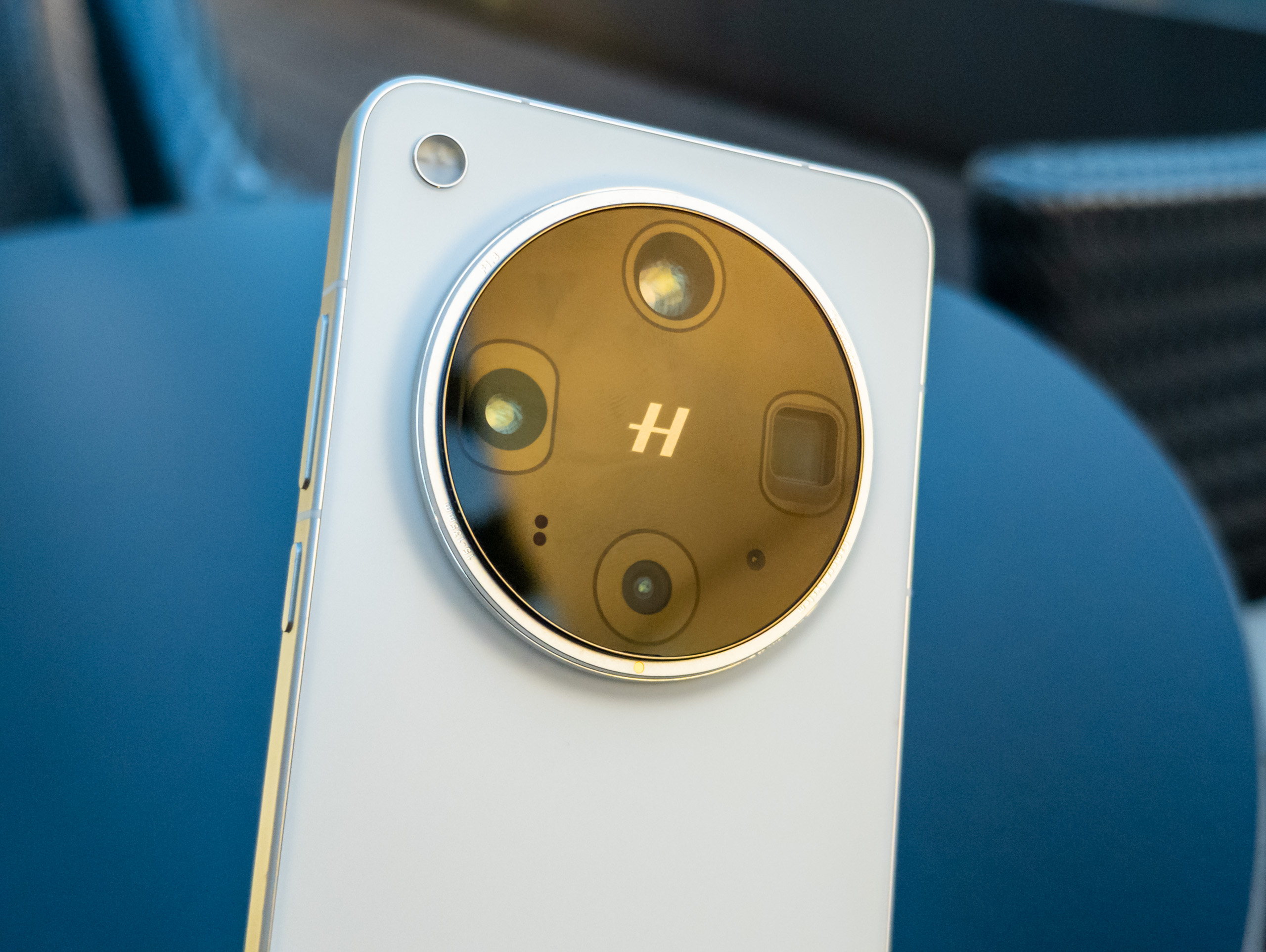 Close-up of the Oppo Find X8 Ultra camera module in white.