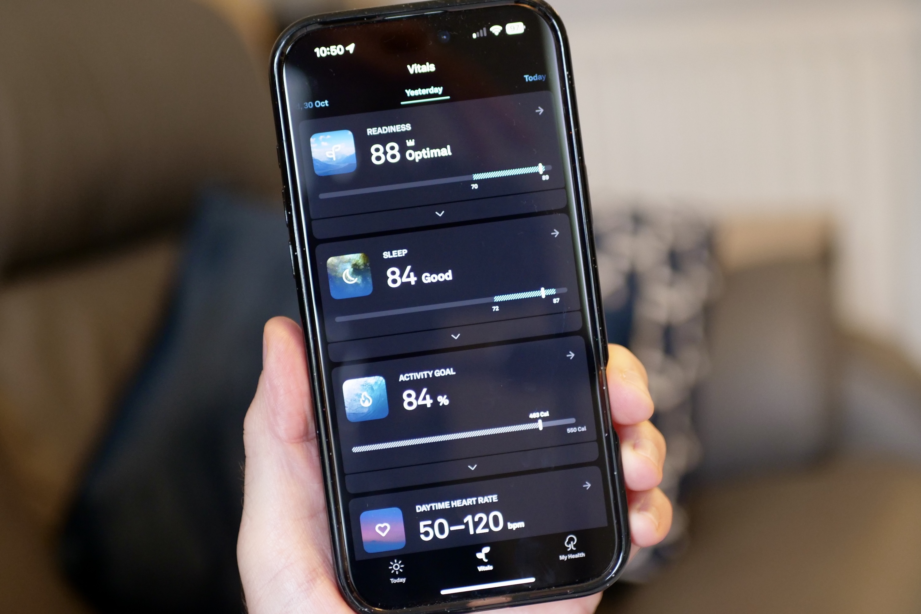 The Oura app on a smartphone displaying the Vitals screen, tracking key health indicators.
