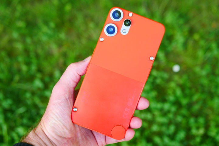 A person holding the CMF Phone 2 Pro.