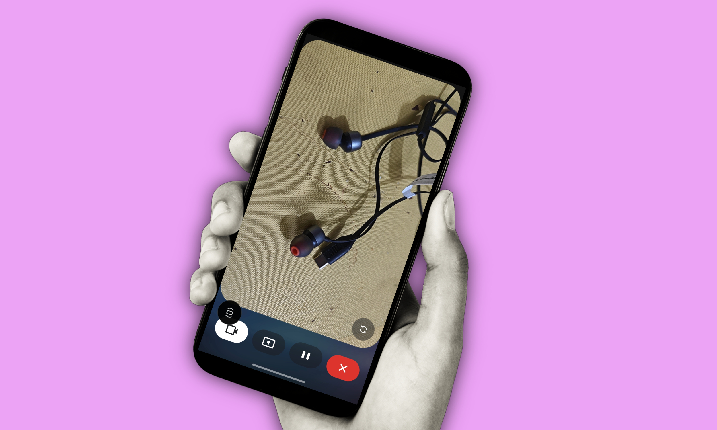 Gemini Live on a smartphone identifying headphones using camera and screen sharing capabilities.