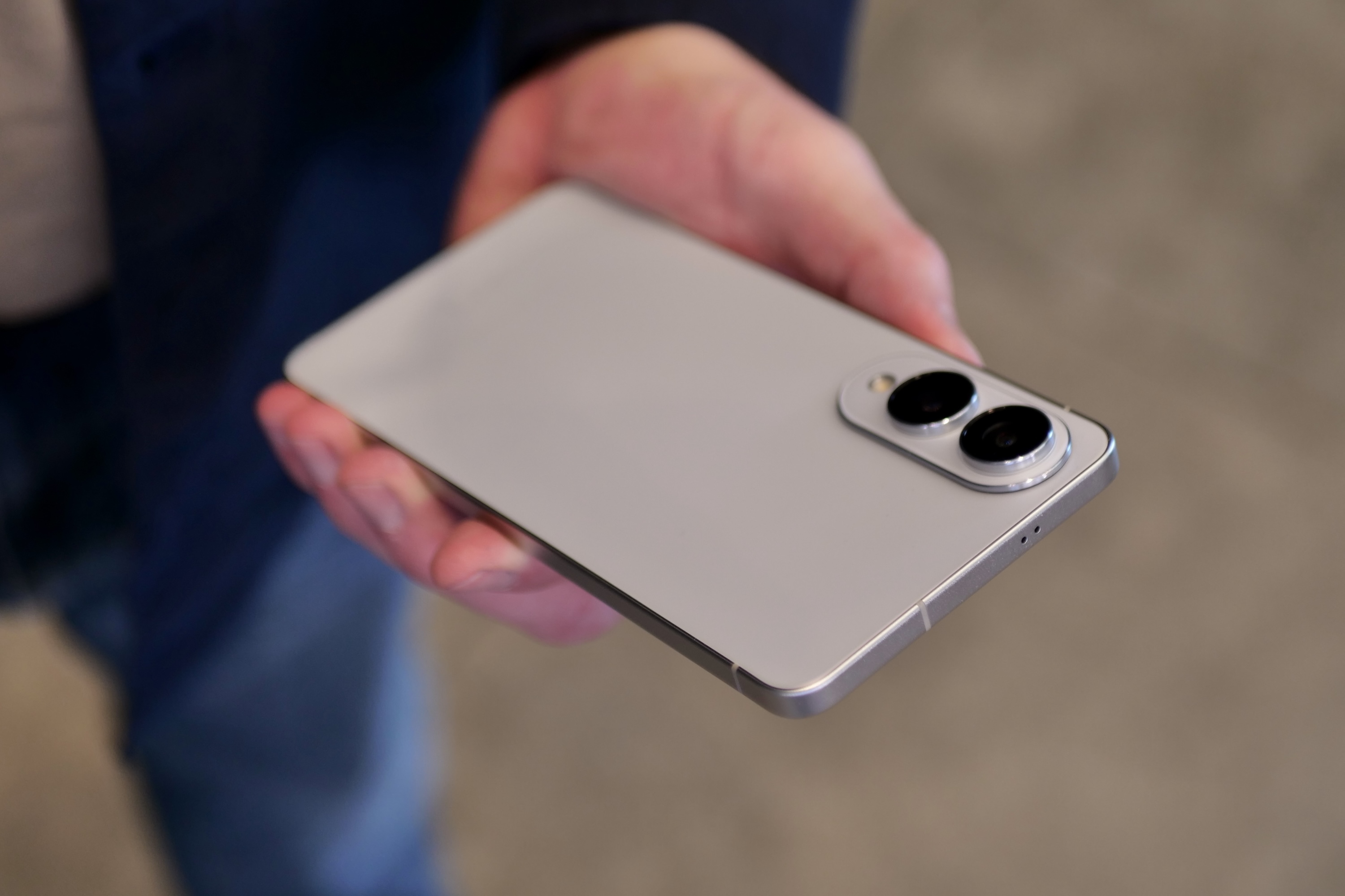 Sleek Samsung Galaxy S25 Edge smartphone held in hand, showcasing its design.