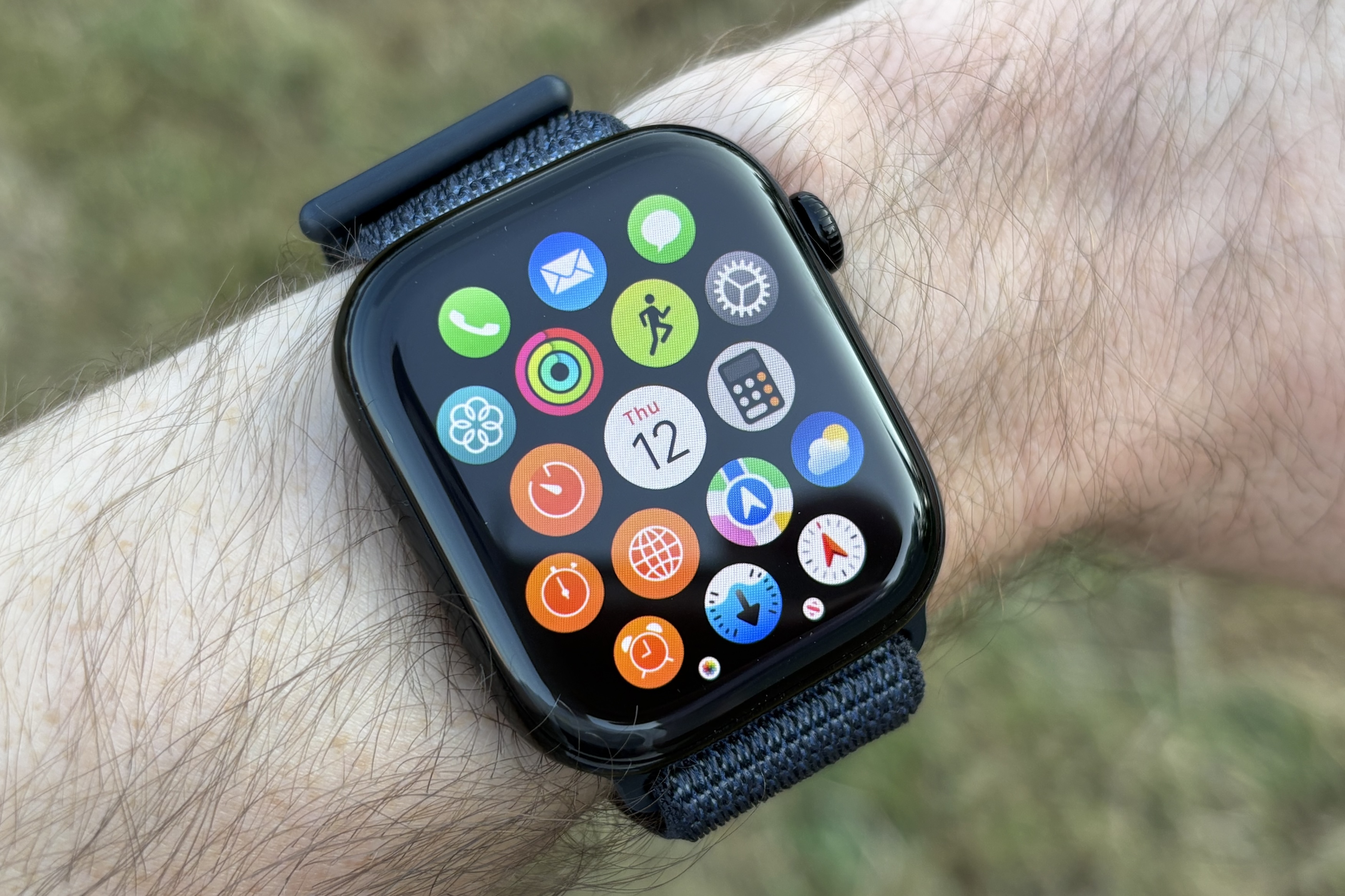 Apple Watch Series 10 displaying its app grid on the screen, showcasing smartwatch deals.