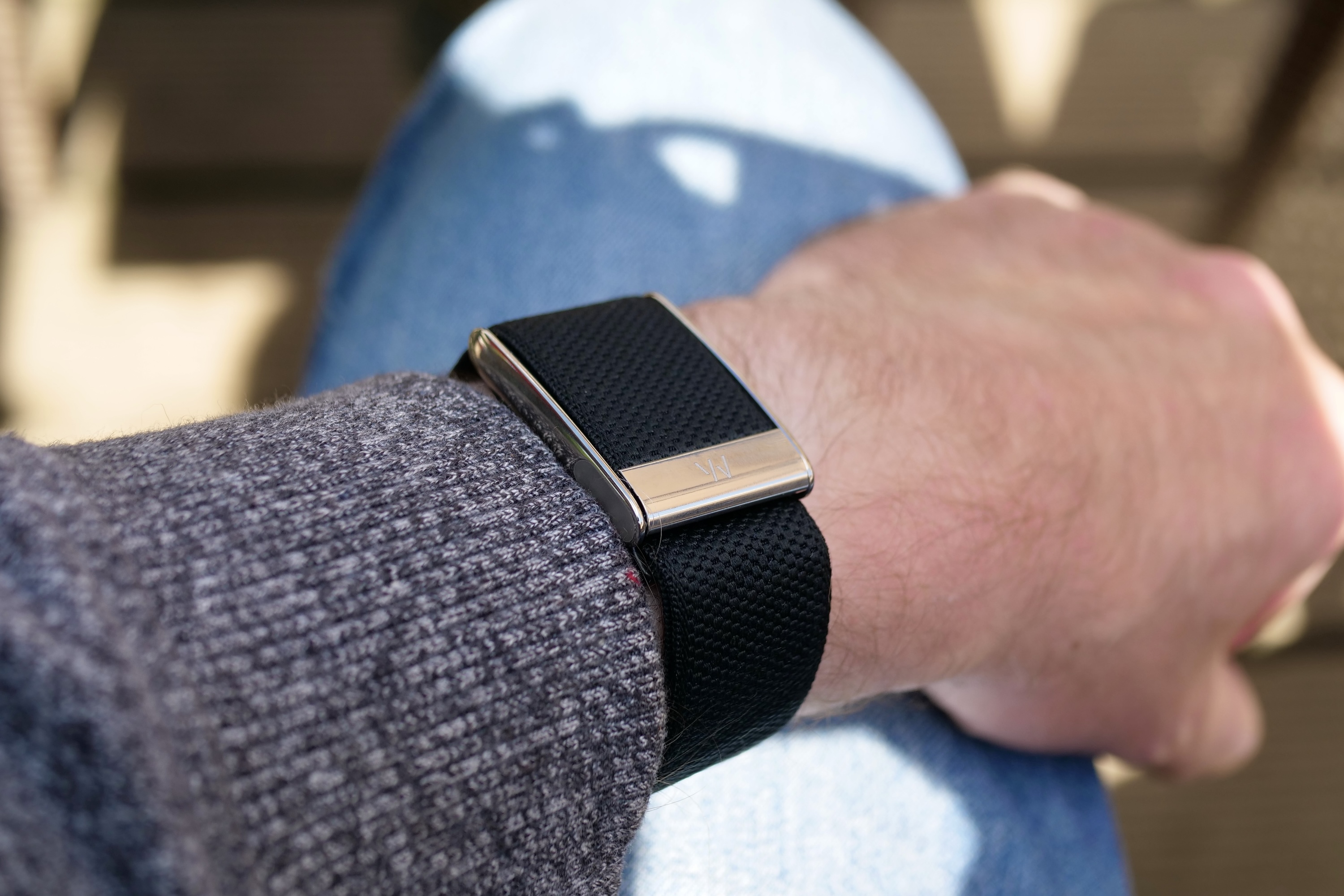 A person wearing the Whoop 5.0.