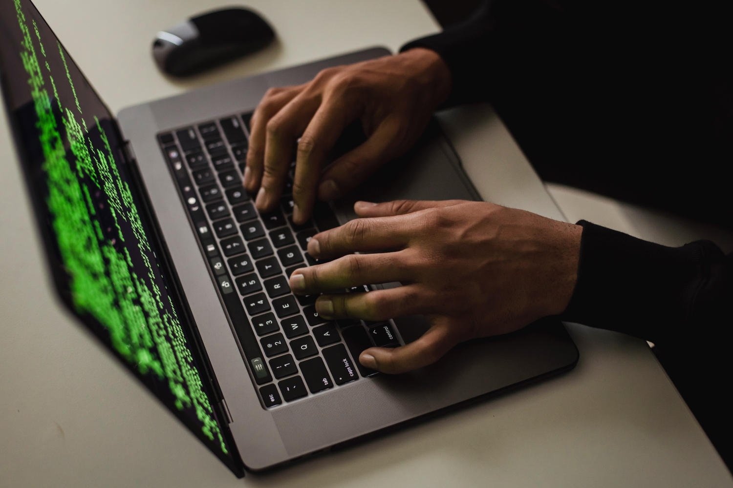 Cybersecurity alert: Laptop displaying code symbolizes the 184 million credentials exposed in a recent data breach.