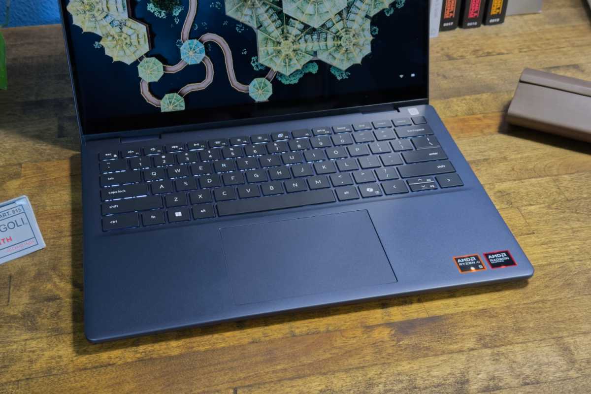 Close-up of the Dell Plus 14 2-in-1 keyboard layout and keys, highlighting its design for comfortable typing.
