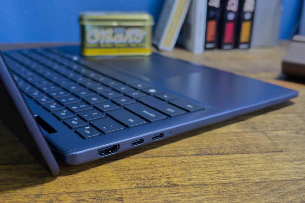 Side view of the Dell Plus 14 2-in-1 showing its available ports, including USB-C and USB-A.