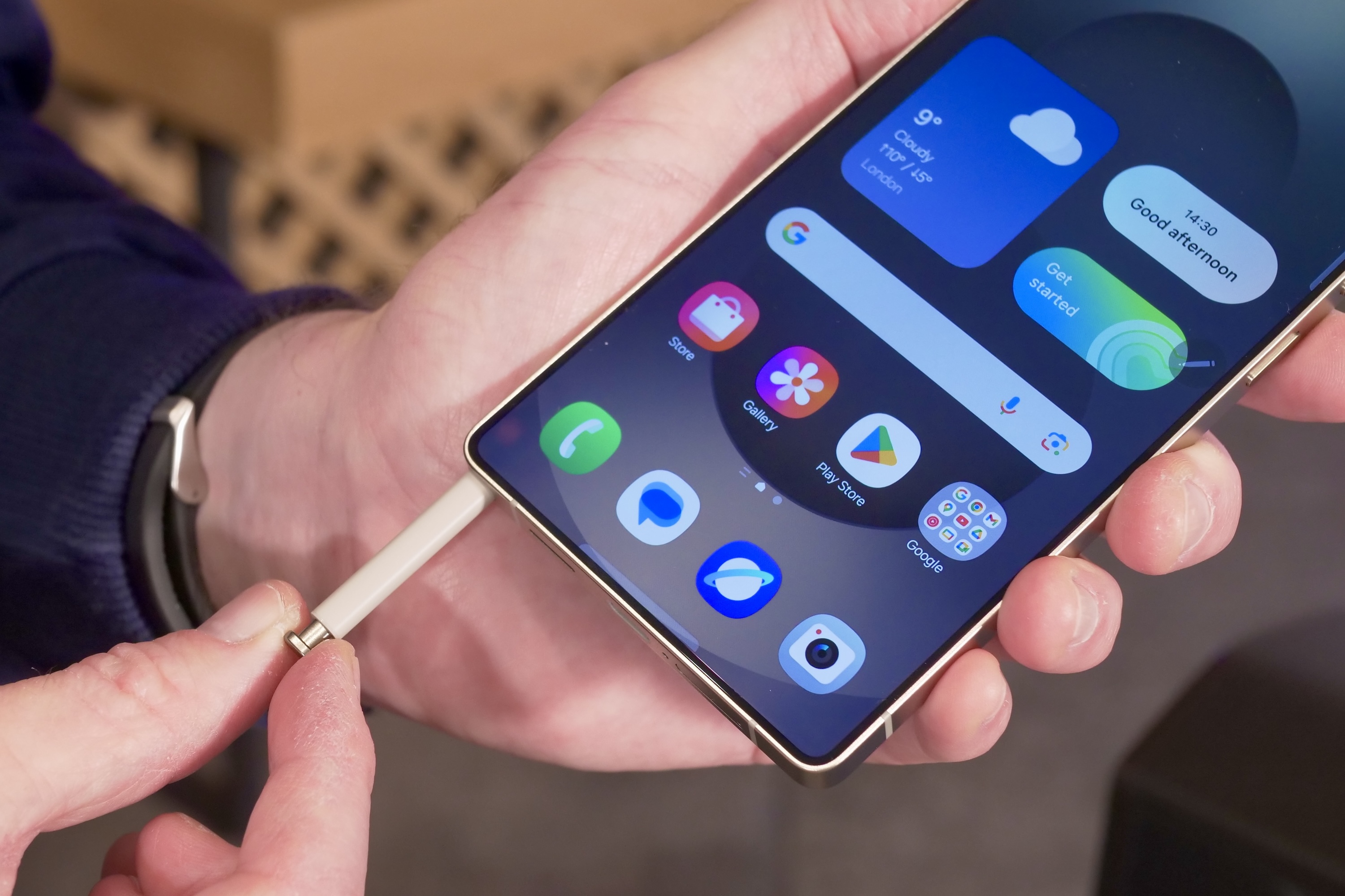 Close-up of S Pen stylus being removed from a Samsung Galaxy S Ultra, hinting at potential Z Fold 7 Ultra features.