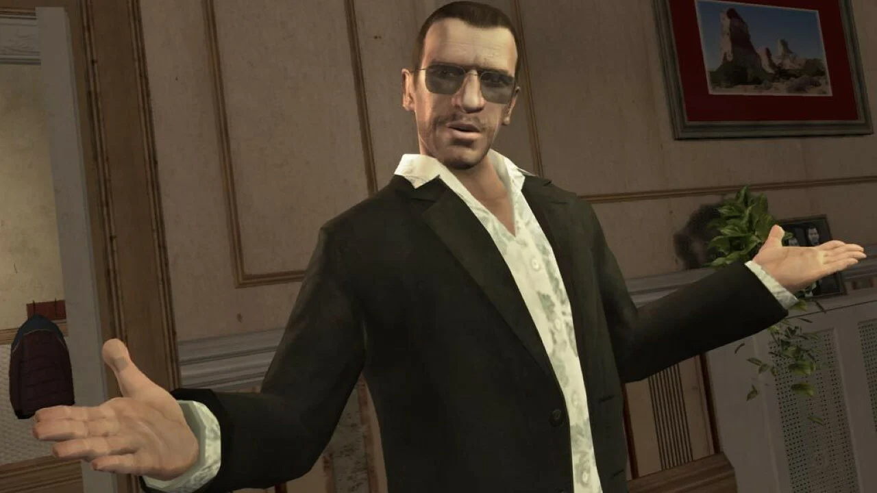 Niko Bellic with arms outstretched against the backdrop of Liberty City in Grand Theft Auto IV.