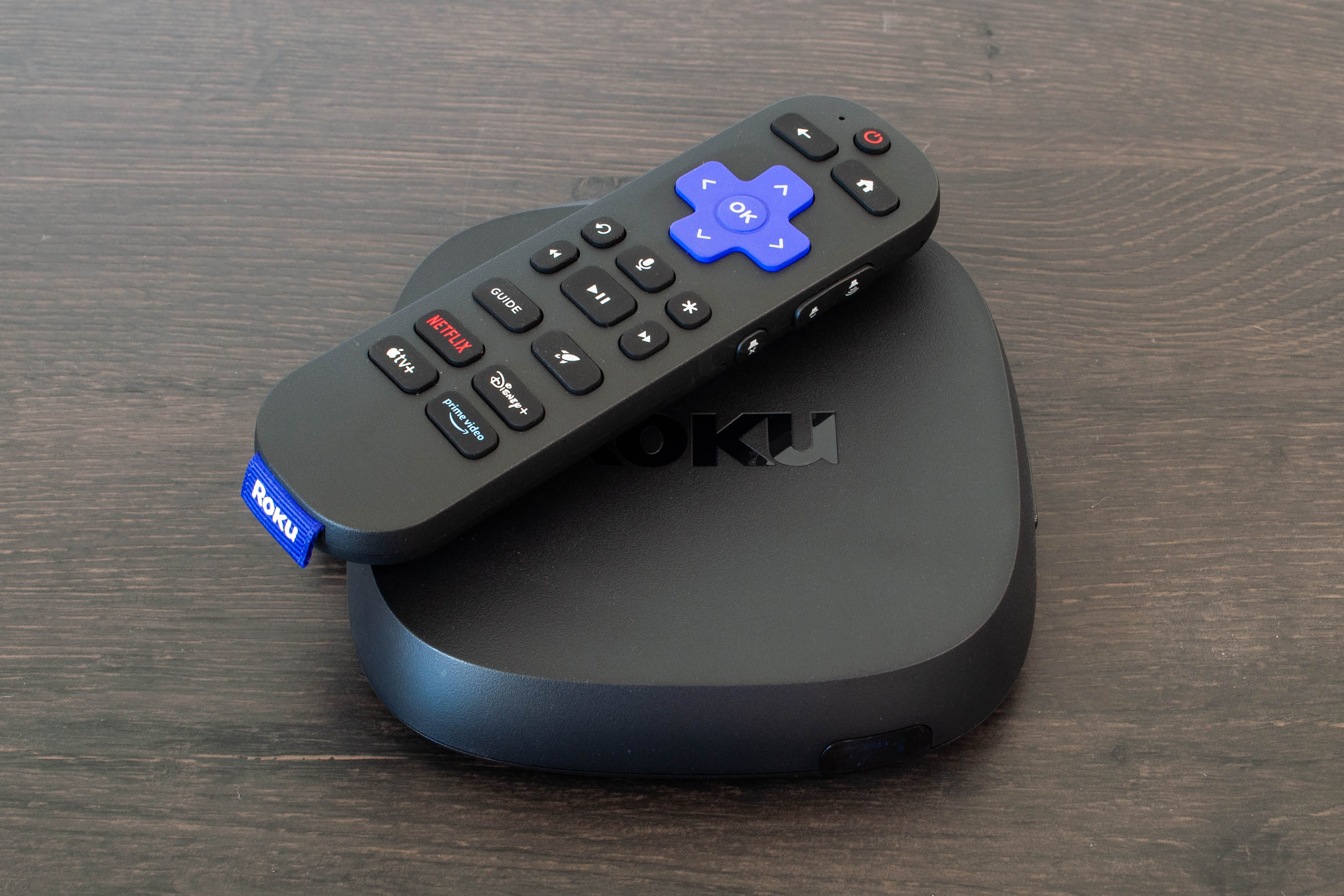 Roku Ultra 2024 4K streaming media player with its voice remote.