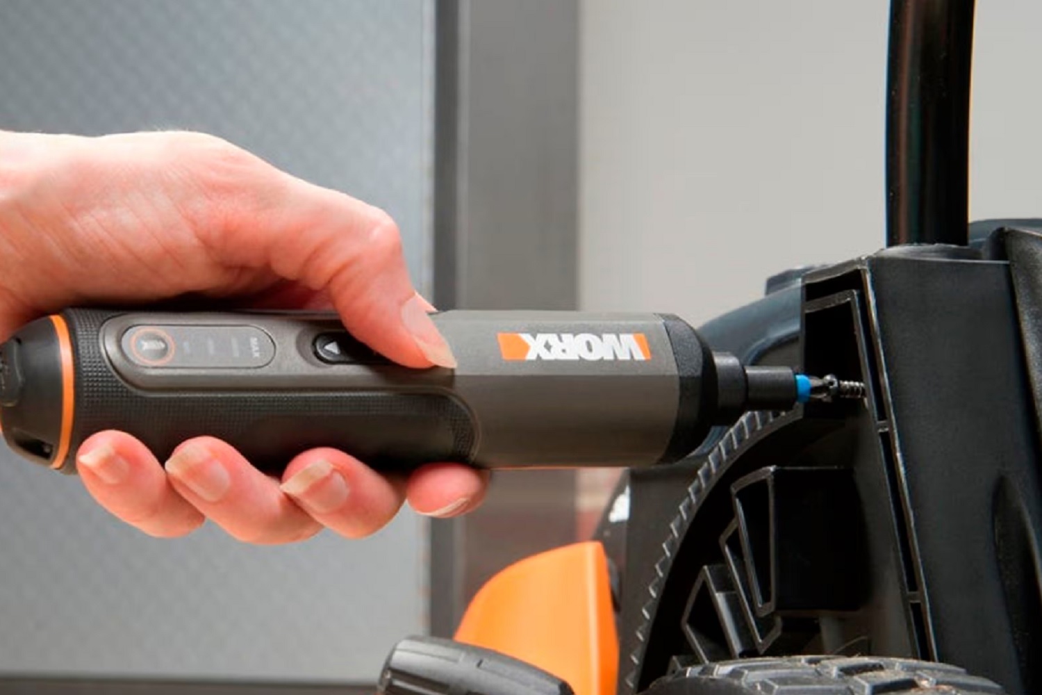 Person using the WORX 4V electric screwdriver for a home DIY project.